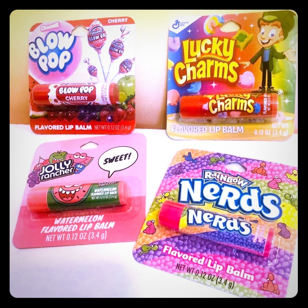 Set of 4 candy lip balms! Smells so good, too cute